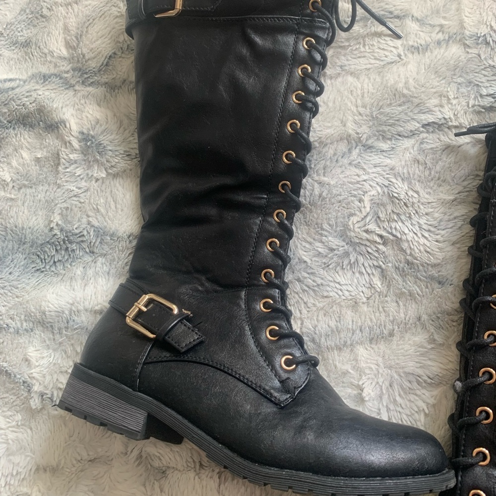 Size 8.5. Black below the knee boots.